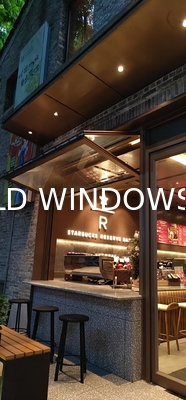 Essentialist Folding Window Philosophy Removing Visual Clutter Through Hidden Hardware and Flush Tracks