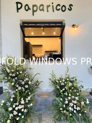 Patio-Integrated Folding Window System Enabling Effortless Entertaining Transitions Between Kitchen and BBQ Areas