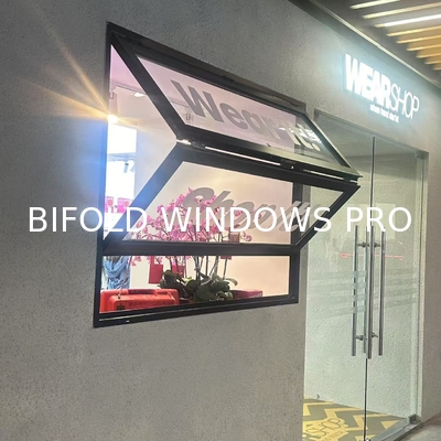 Wide-Angle Folding Window Assembly Creating Uninterrupted Garden Perspectives and Easy-Access Patio Connections