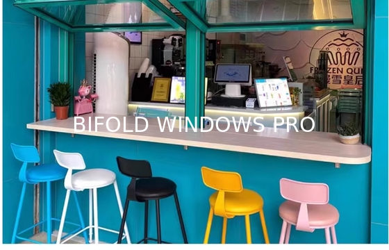 Slim-Profile Frameless Folding Window Illusion Creating Near-Invisible Transitions Between Interior and Deck Areas