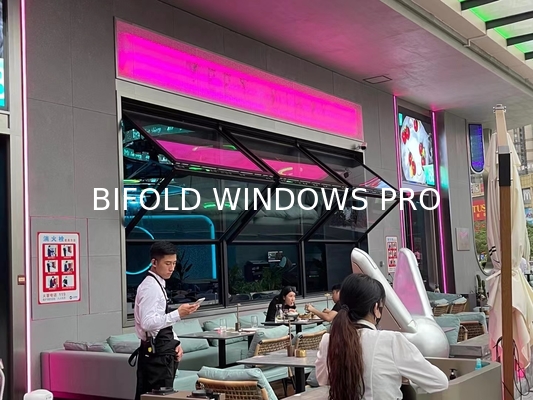 Slim-Profile Frameless Folding Window Illusion Creating Near-Invisible Transitions Between Interior and Deck Areas