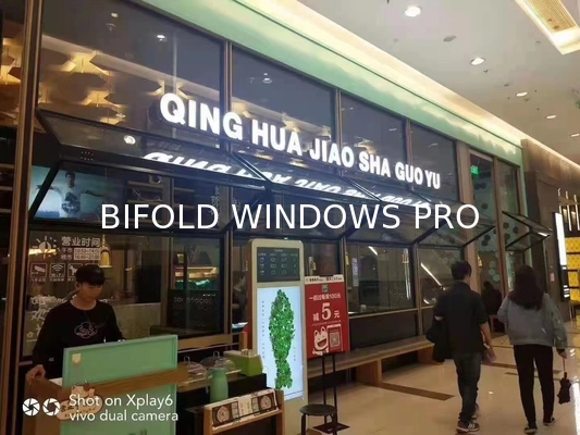 Slim-Profile Frameless Folding Window Illusion Creating Near-Invisible Transitions Between Interior and Deck Areas