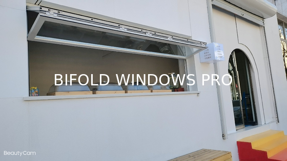 Biophilic Folding Window System Blending Indoor Living Spaces with Container Gardens and Balcony Greenery Seamlessly