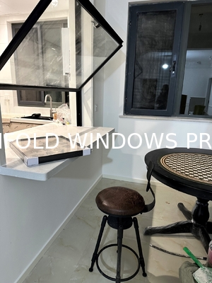 Wide-Format Folding Window Configuration Framing Mountain Vistas and Urban Skyline Views with Minimal Framework