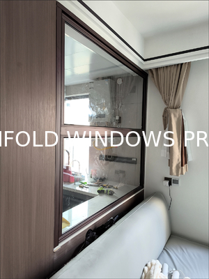 Wide-Format Folding Window Configuration Framing Mountain Vistas and Urban Skyline Views with Minimal Framework