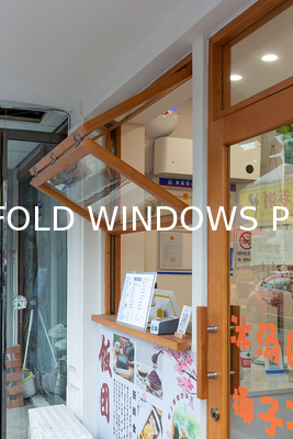 Cooking Station Folding Window Allowing Pass-Through Service to Outdoor Dining Areas During Entertaining