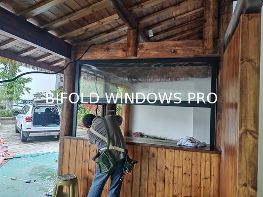 Cooking Station Folding Window Allowing Pass-Through Service to Outdoor Dining Areas During Entertaining