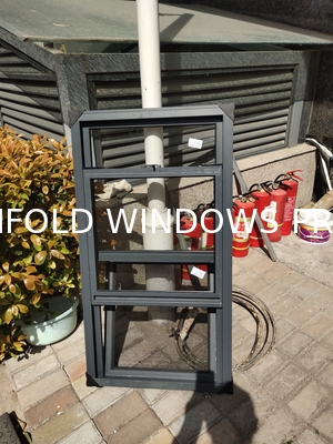 Water-Reflective Folding Window Design Amplifying Natural Light Through Strategic Shoreline Positioning