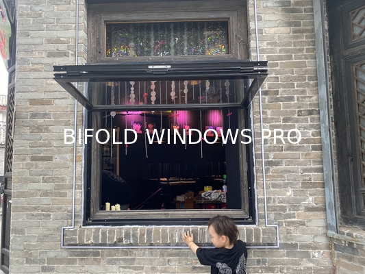 Water-Reflective Folding Window Design Amplifying Natural Light Through Strategic Shoreline Positioning
