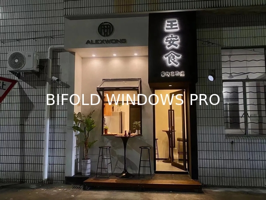Western Exposure Folding Window Design Capturing Dramatic Evening Color Transitions on Interior Walls