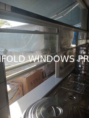 Front Beach House Folding Window Engineered for Continuous Salt Air Exposure and Storm Surge Protection
