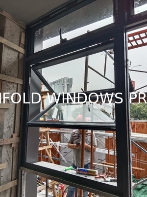 View Alpine Cabin Folding Window Framing Vertical Cliff Faces and Eagle Nesting Sites