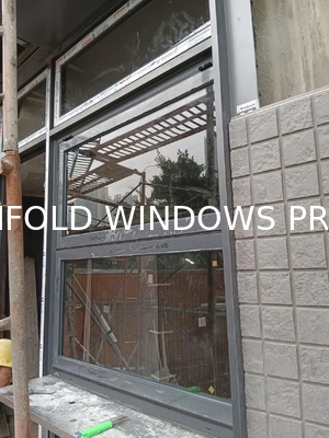 View Alpine Cabin Folding Window Framing Vertical Cliff Faces and Eagle Nesting Sites
